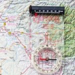 Photo of a map and compass