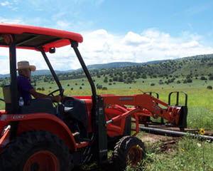 Working Ranch Guest Forrest and Tractor