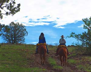 Cowgirls Headin' Out On Horseback
