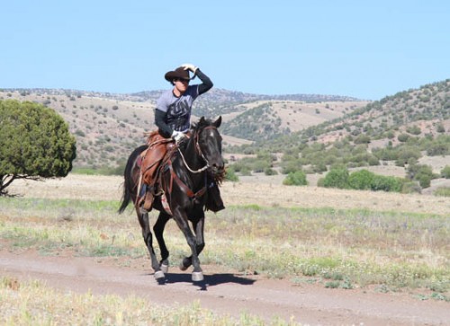 Cowgirl Erin rides Blackie the Horse